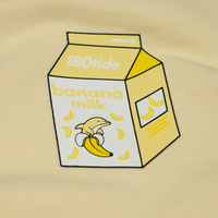 Close-up of Bandan the Banana Dolphin in the banana milk carton chest print on the Bandan Banana Dolphin Milk Crewneck