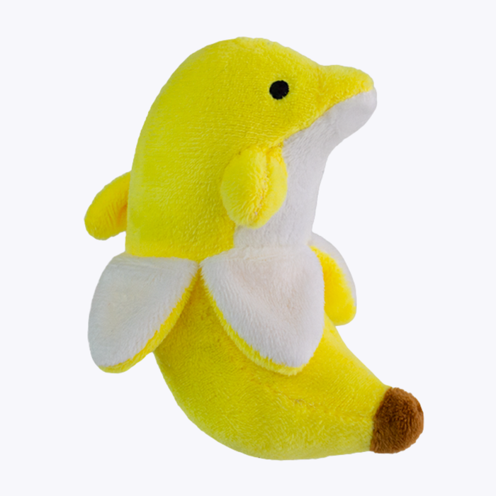 BanDan the Banana Dolphin Miniature Plush, photographed at a three-quarter angle against a light grey studio background