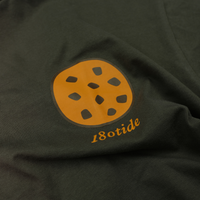 Close-up of the cookie chest print on the Espresso Chip the Cookie Bear Tee