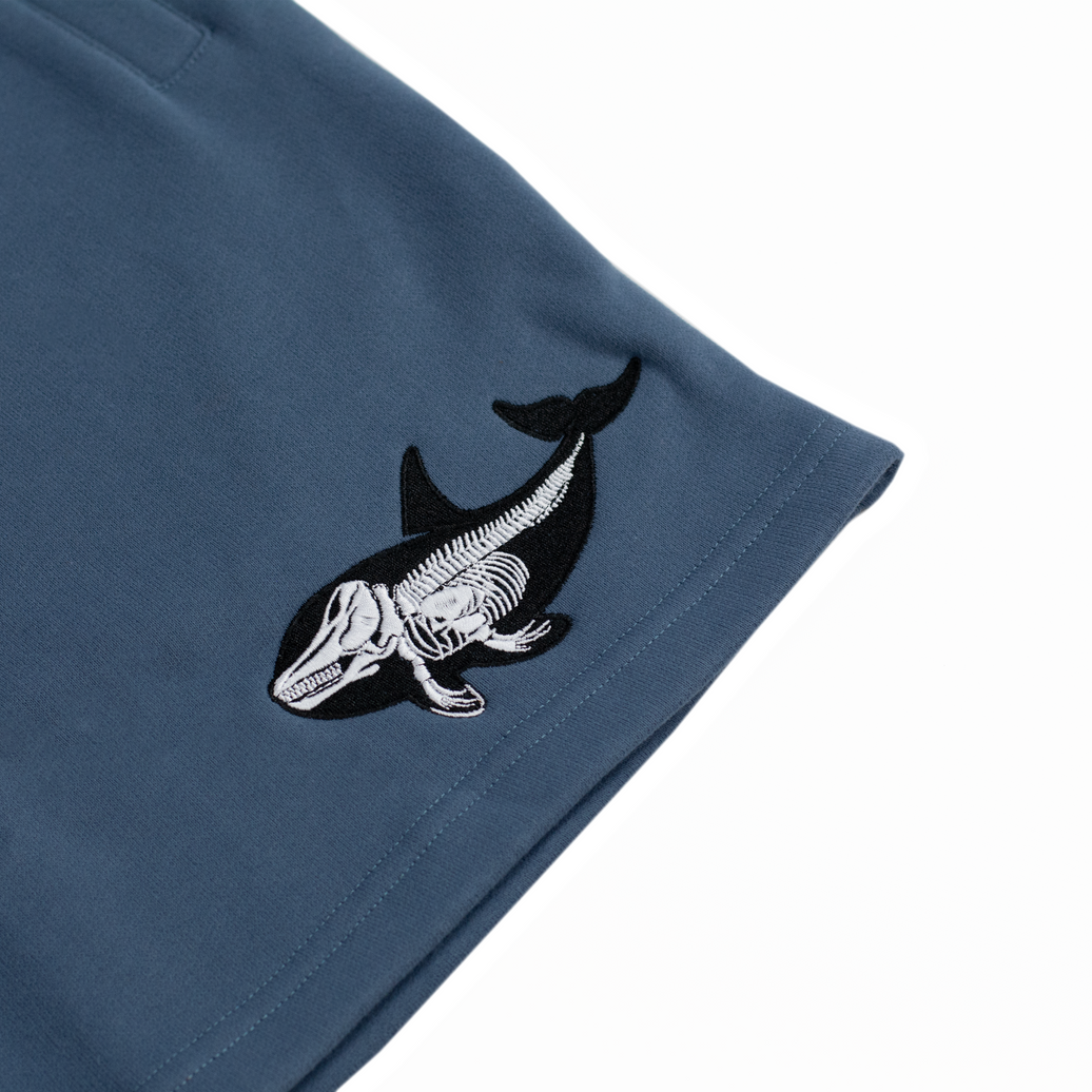 Killer Whale Skeleton Sweatshorts – Stone, embroidery close-up