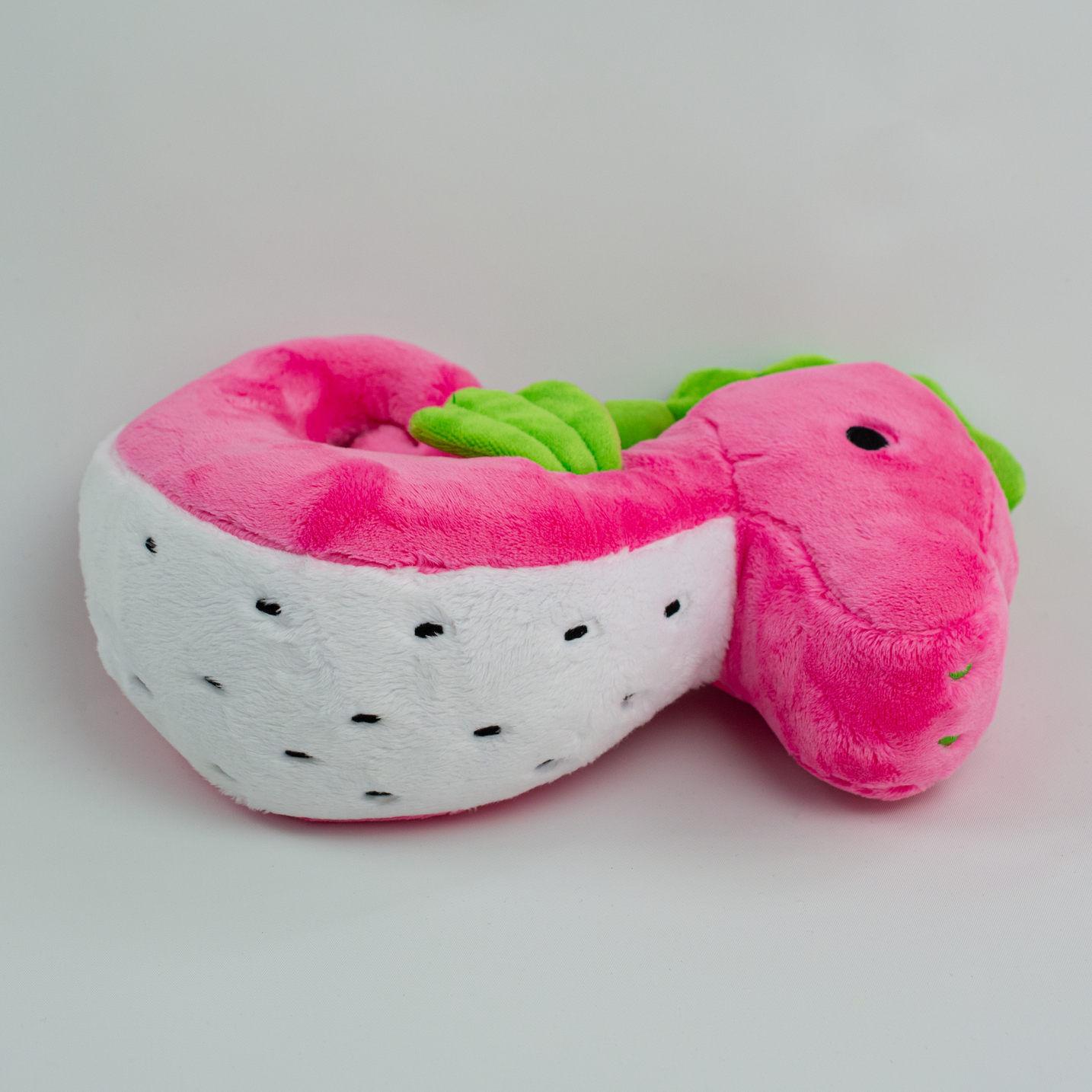 Sol the Dragonfruit Seahorse Plush, lying back view