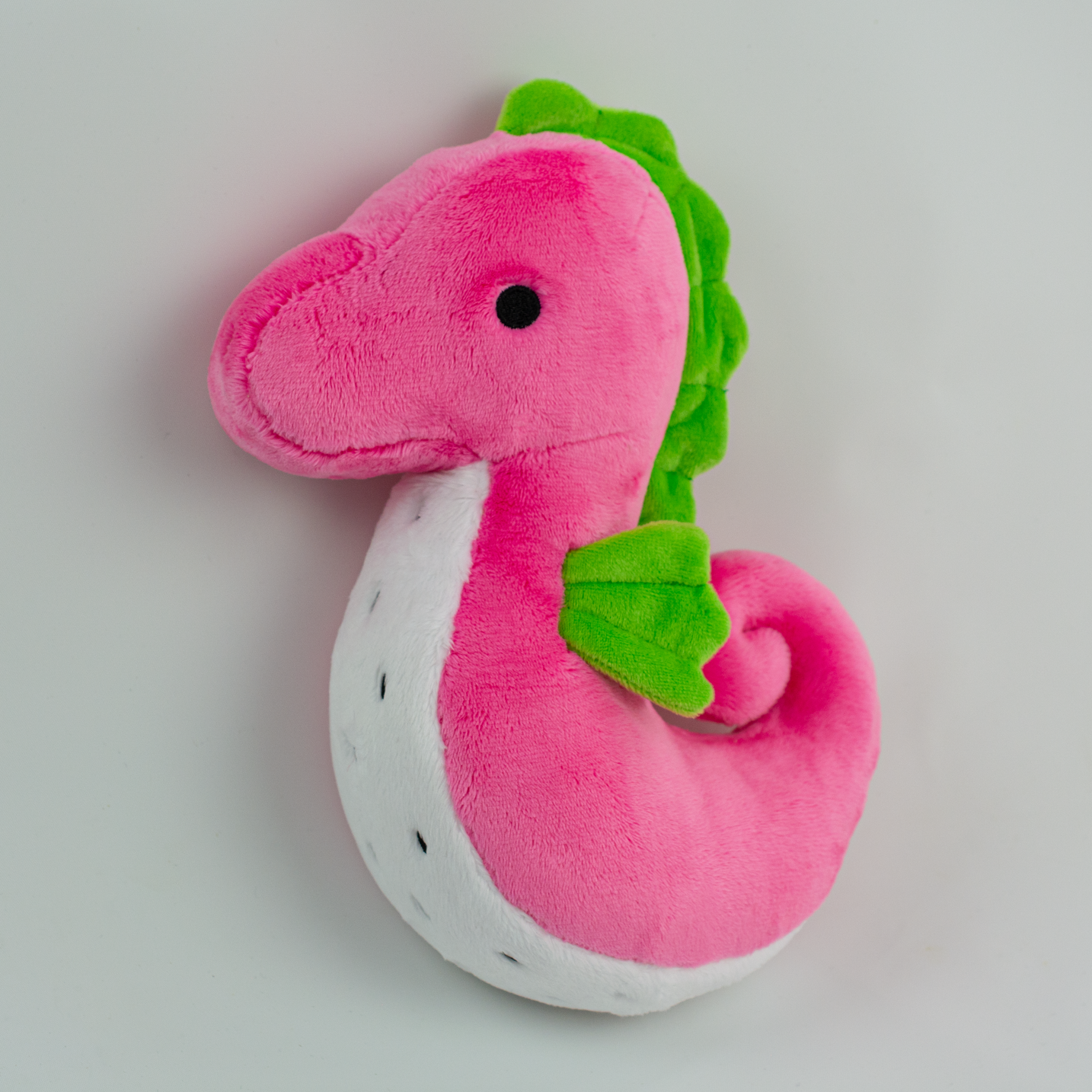 Sol the Dragonfruit Seahorse Plush, side view