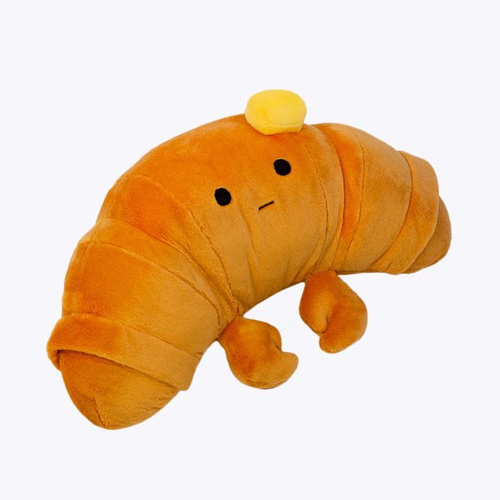 Tank the Croissant Crab Plush, three-quarter view other side